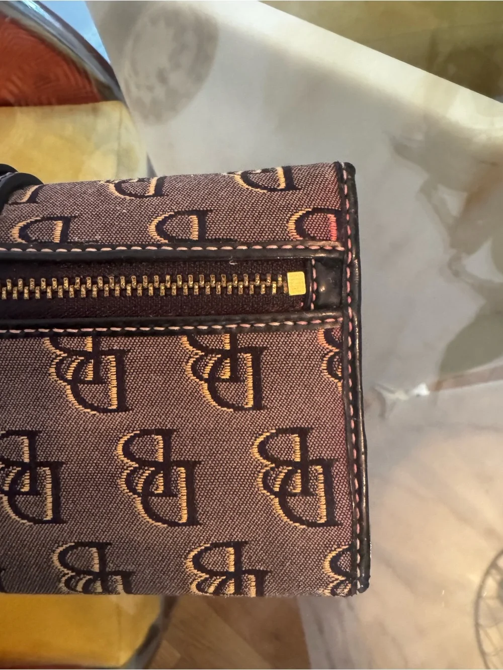 Dooney & Bourke Brown Logo Continental Wallet with Black Strap and Gold Hardware